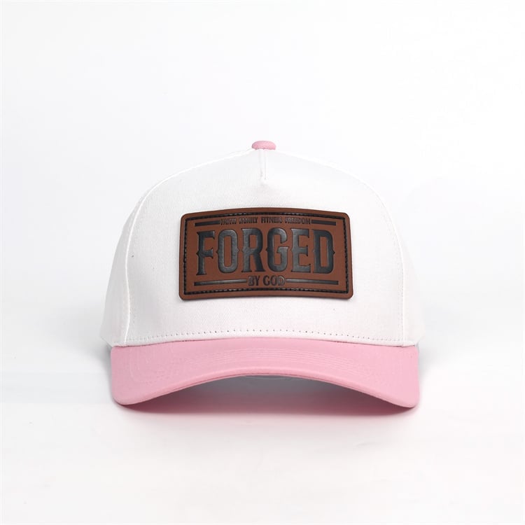 White and pink baseball cap with brown leather Forged patch on front